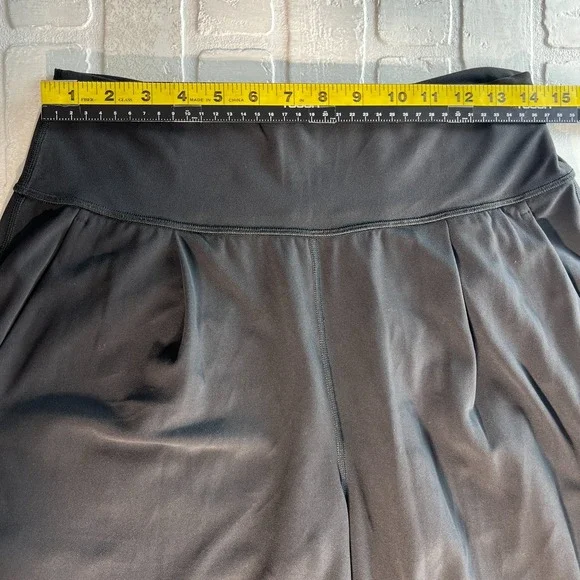 Athleta Elation Pants Women Medium Black Tapered Pleated Stretch Knit Athleisure - Picture 3 of 14